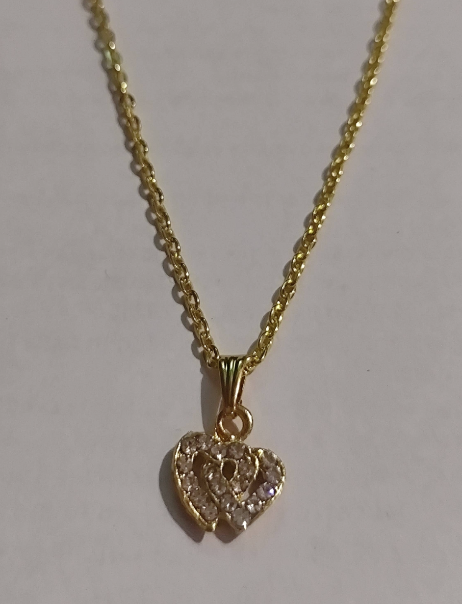 Gold-tone double heart pendant necklace paved with cubic zirconia stones