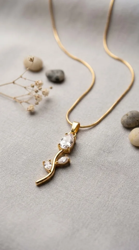 Gold branch pendant necklace with clear crystal accents
