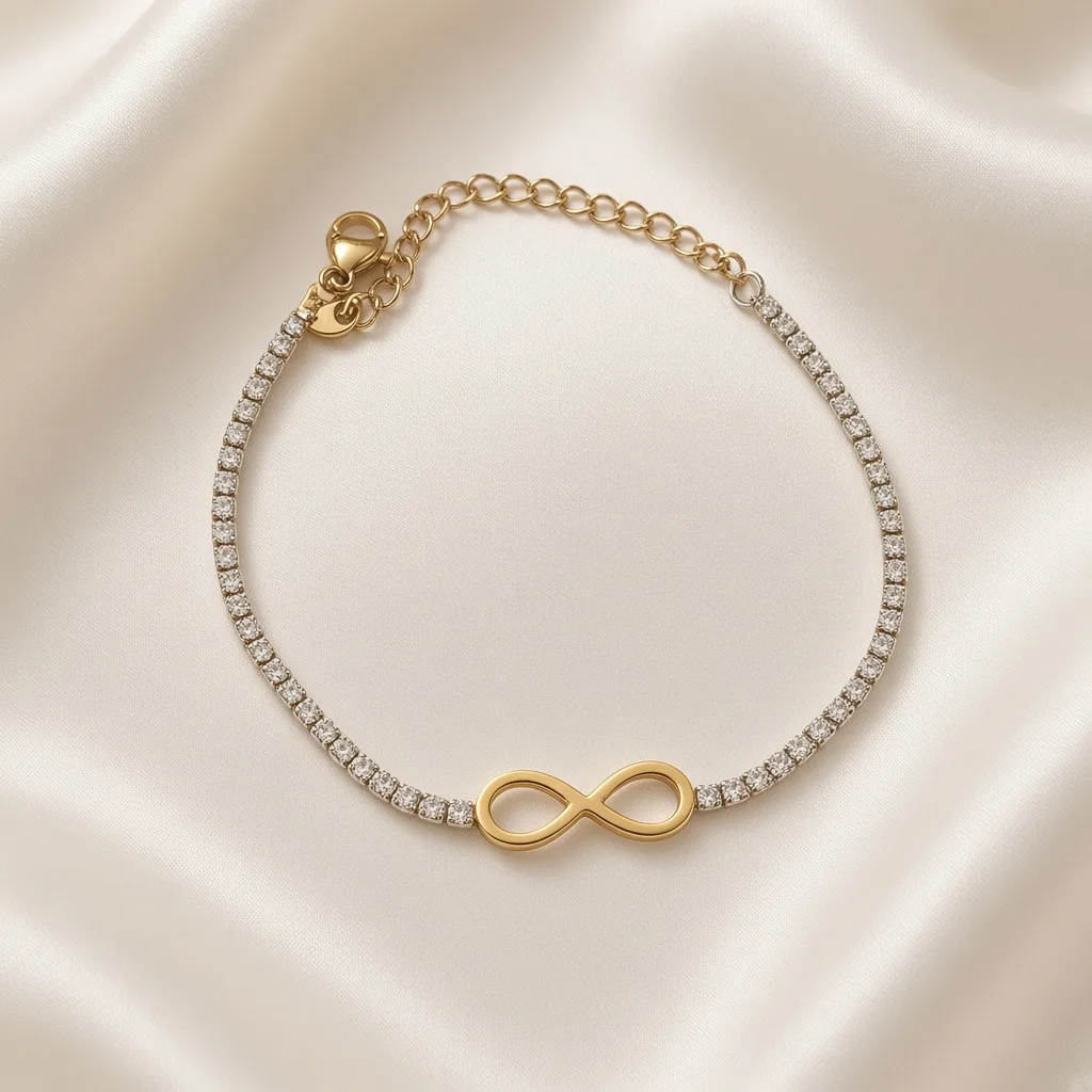 Two-tone cubic zirconia tennis bracelet with infinity symbol charm