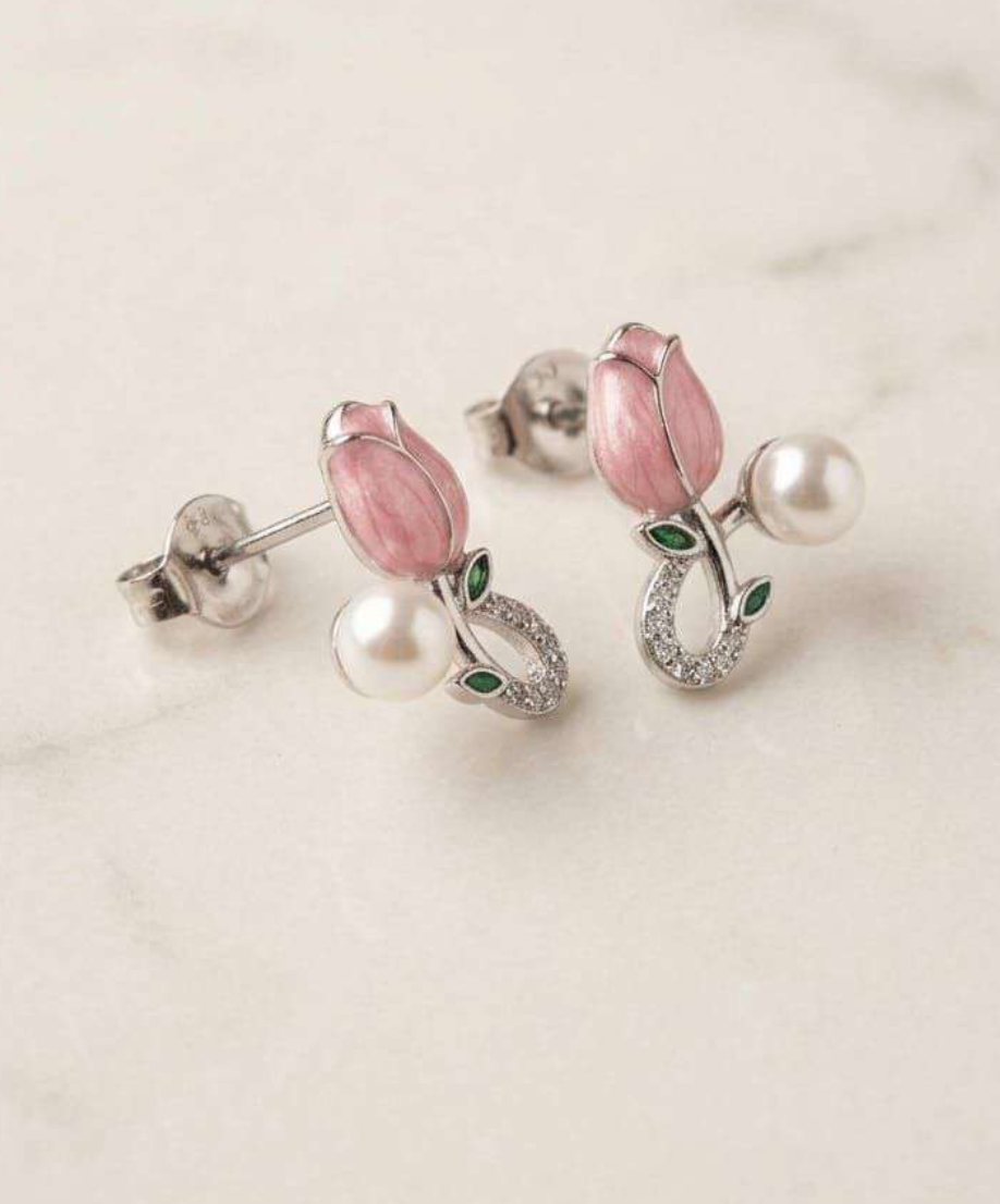 Silver-tone pink tulip stud earrings with pearl and cubic zirconia stem, front view