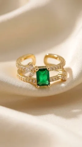 Gold adjustable open ring with emerald-cut green crystal and cz accents