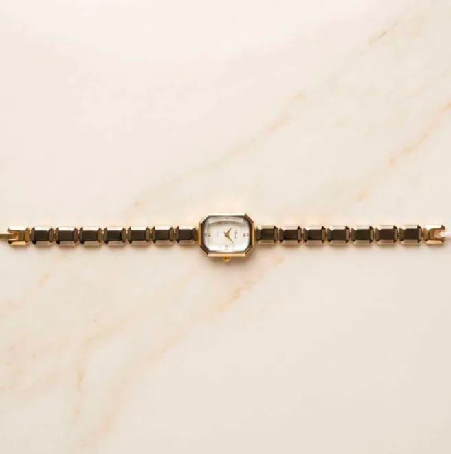 Gold-tone vintage-style link bracelet watch with rectangular white dial