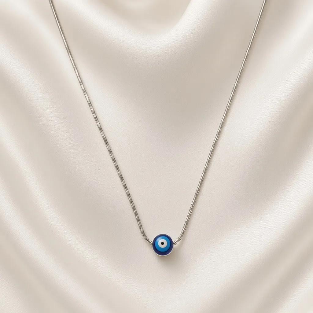 Silver snake chain with a blue nazar evil-eye bead pendant — anti-tarnish necklace by The Luxe Jewels