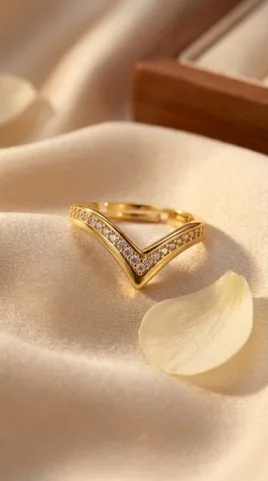 Gold chevron V-shaped ring with pave cubic zirconia stones