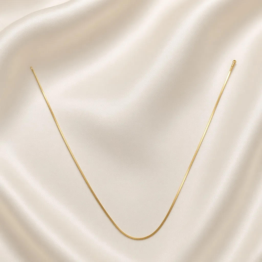 Slim gold snake chain necklace on white silk — 18k gold plated anti-tarnish necklace by The Luxe Jewels