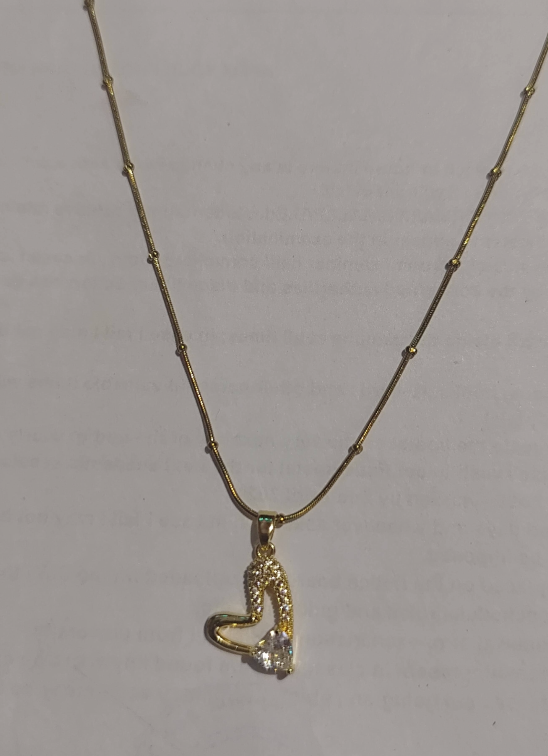 Gold beaded snake chain necklace with cubic zirconia heart pendant